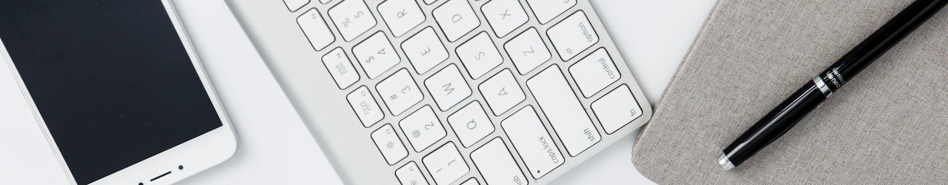 Clip art of smartphone, keyboard, and pen